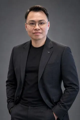 AI-generated studio portrait of Louis Thong, made at AI Odyssey, September 2026